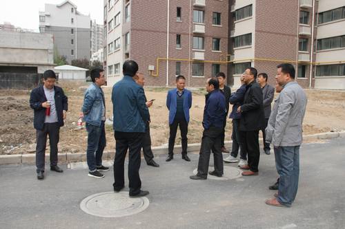 銅煤公司承建的銅煤2#小區(qū)水仙居5、6、7、8#樓順利通過竣工驗收