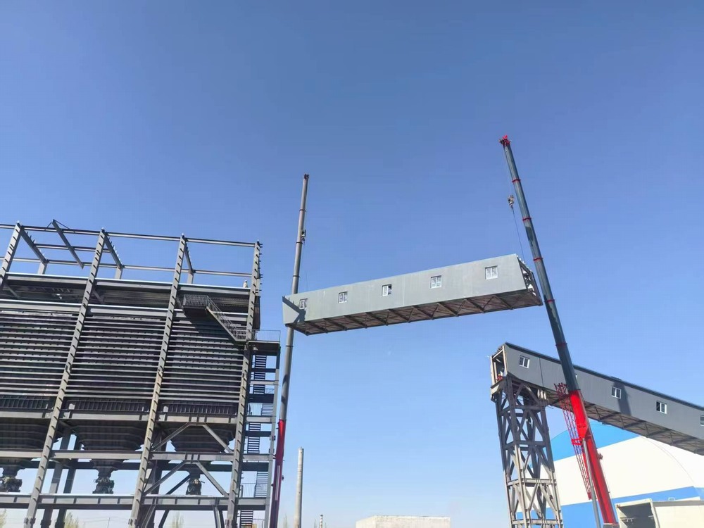 陜煤建設(shè)天工公司新疆第一項(xiàng)目部：雙機(jī)協(xié)作展絕技，棧橋凌空貫長虹